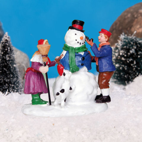 Lichthäuser Miniaturfiguren „Kinder bauen Schneemann”
