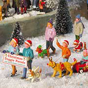 Lichthäuser Miniaturfiguren Set „Weihnachts-Hunde-Parade”